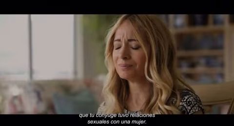 An actress, eyes closed, in distress