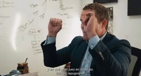 Ballard acting out a fist-pump and face-palm